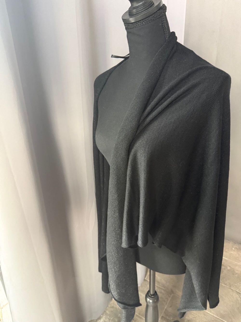 Black Women's Open-Front Knit wrap with a little sparkle.